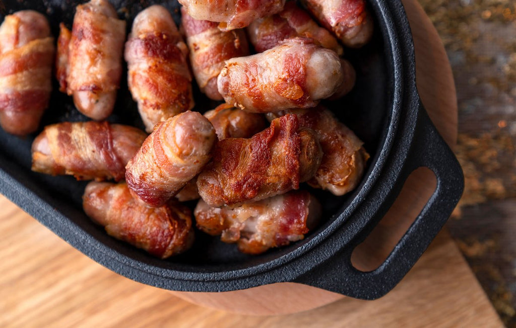 https://ooni.com/cdn/shop/articles/Cast_iron_pigs_blankets_4-1202x765-7c31fca_1.jpg?crop=center&height=1024&v=1606832703&width=1024