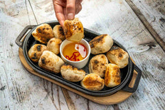 Dough balls with a hot honey dipping sauce