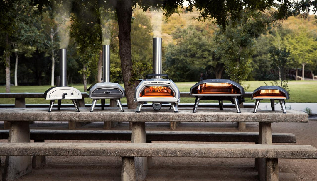 Collection of Ooni pizza ovens including Ooni Karu 16 pizza oven, Ooni Koda 16 pizza oven and Ooni Fyra 12 pizza oven