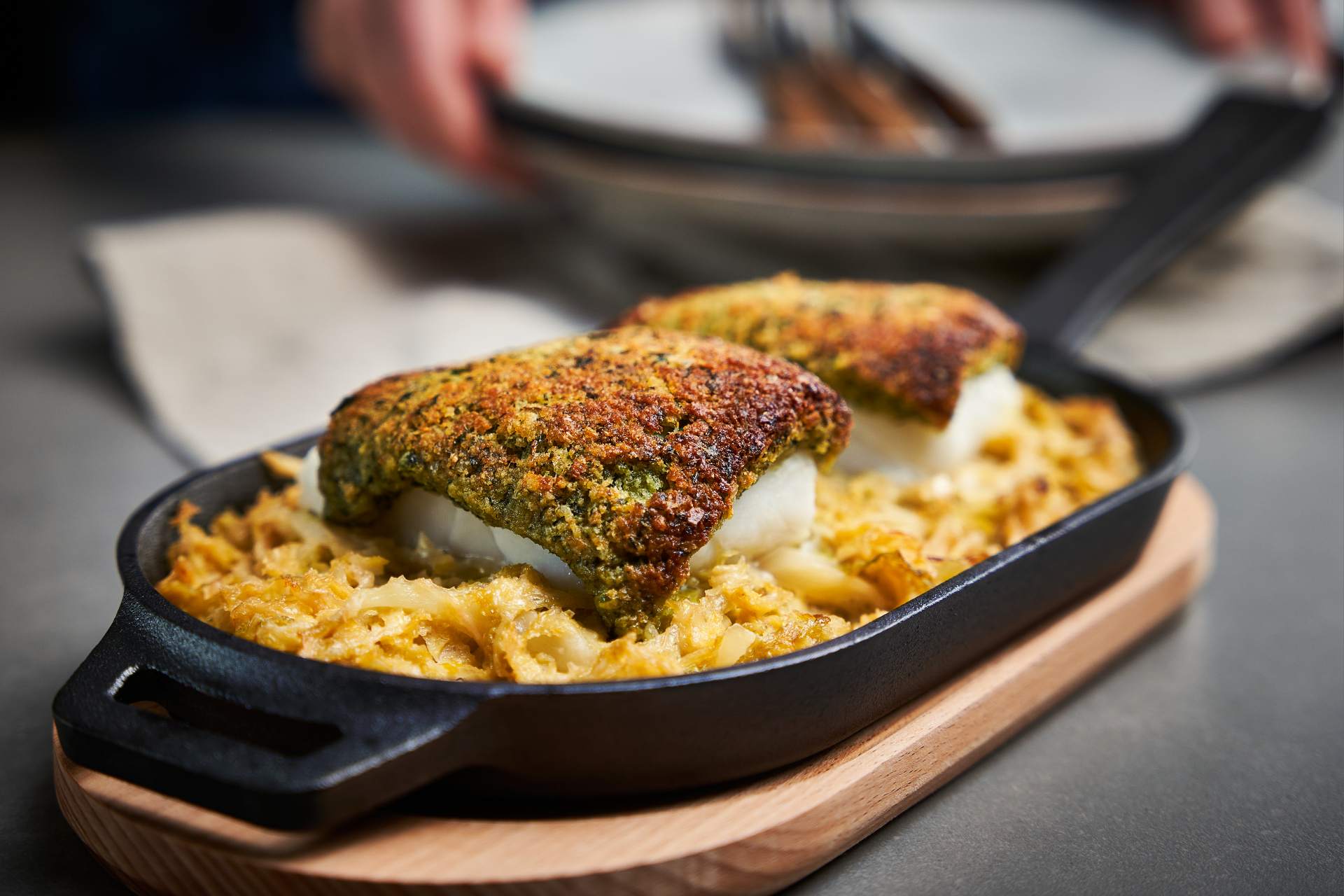Herb-crusted cod with creamed Savoy cabbage recipe — Ooni USA