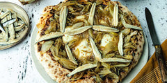 French Pissaladière Pizza with Olive Béchamel, Caramelized Onions, Anchovies and Mozzarella