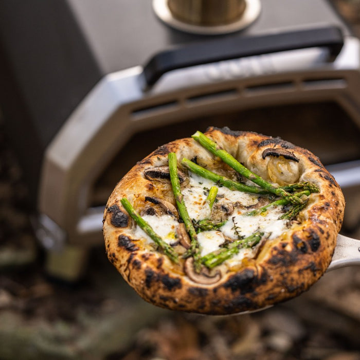 White Pizza with Asparagus, Chestnut Mushrooms, and Thyme.