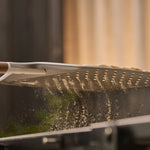 Close up of flour falling through signature peel perforations 