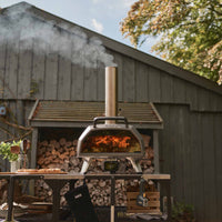 Ooni Karu 2 Pro pizza oven in outdoor setting