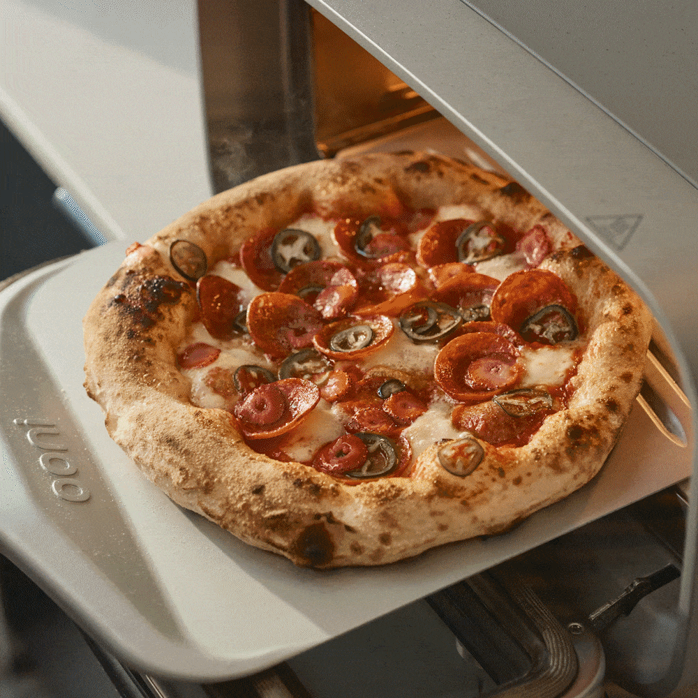 Animated GIF showing pizza, cookies, fish, bagels, and dough proofing being made in the Ooni Volt 2 electric pizza oven.